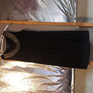 Valerie Bertinelli black dress sequins around knock line